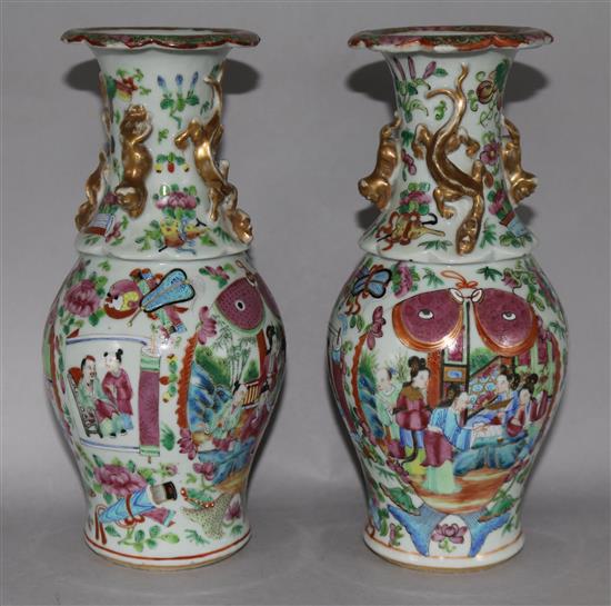 A pair of Chinese Famille Rose twin fish vases, 19th Century